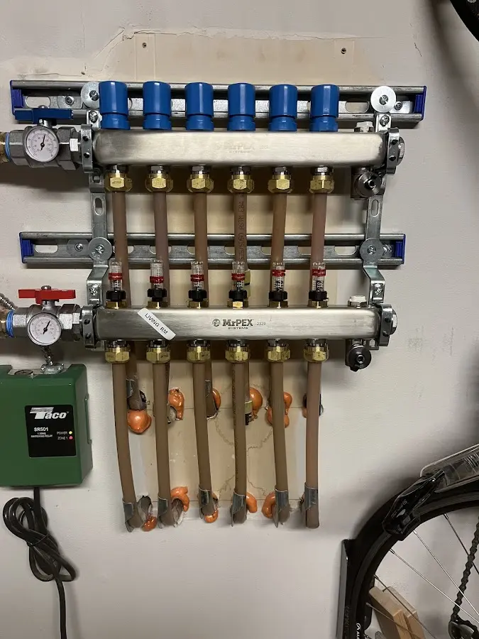 Plumber performing Gas Line Installation at a residential property in Athens