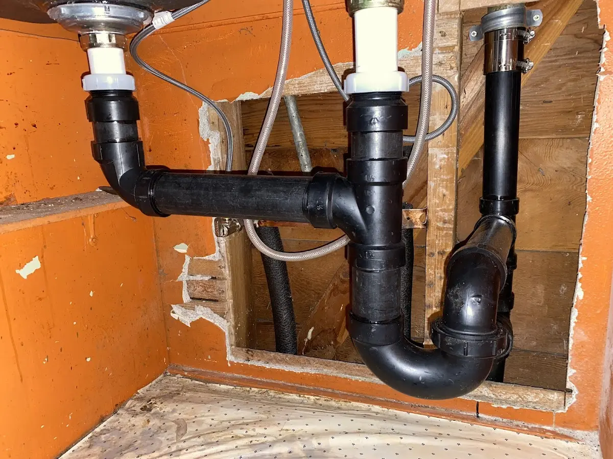 Professional Garbage Disposal Repair equipment and tools on the job in Athens